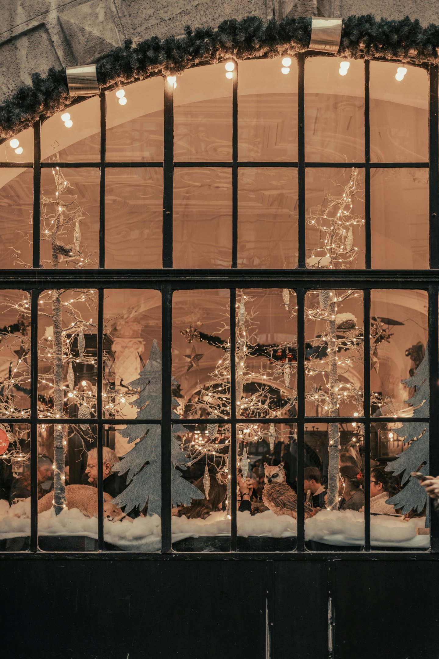Snowy Christmas Scene through Glass - Photo by Mâide Arslan Pexels